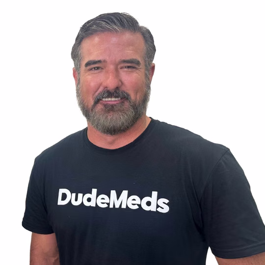 DudeMeds co-founder in a black DudeMeds shirt.